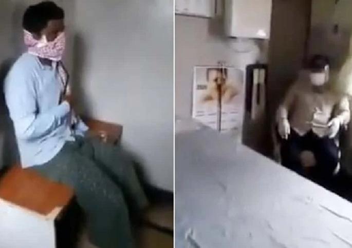 doctor using long stethoscope to prevent coronavirus twitter users loved it see viral video | कोरोनापासून बचावासाठी डॉक्टरचा 'देसी जुगाड'; रुग्णांवर असा केला जातोय उपचार doctor using long stethoscope to prevent coronavirus twitter users loved it see viral video | कोरोनापासून बचावासाठी डॉक्टरचा 'देसी जुगाड'; रुग्णांवर असा केला जातोय उपचार