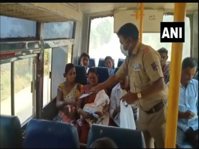 Coronavirus: Beware of 'Corona'! Passengers felt masks by the bus conductor | Coronavirus : 'कोरोना'बाबत खबरदारी! बस कंडक्टरने प्रवाश्यांना वाटले मास्क Coronavirus: Beware of 'Corona'! Passengers felt masks by the bus conductor | Coronavirus : 'कोरोना'बाबत खबरदारी! बस कंडक्टरने प्रवाश्यांना वाटले मास्क
