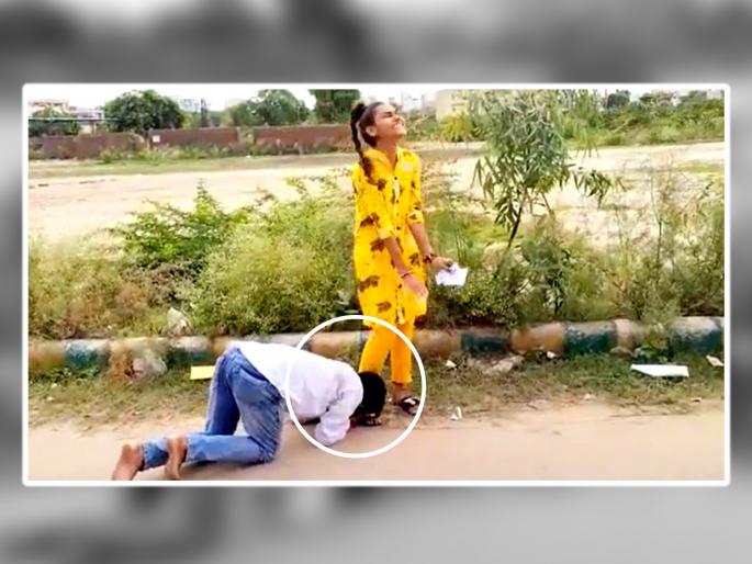 boy touches girls feet on roads to ask for votes viral video student election in Rajasthan watch | निवडणुकीआधी उमेदवाराने भररस्त्यात मुलीच्या पायावर घातलं लोटांगण boy touches girls feet on roads to ask for votes viral video student election in Rajasthan watch | निवडणुकीआधी उमेदवाराने भररस्त्यात मुलीच्या पायावर घातलं लोटांगण