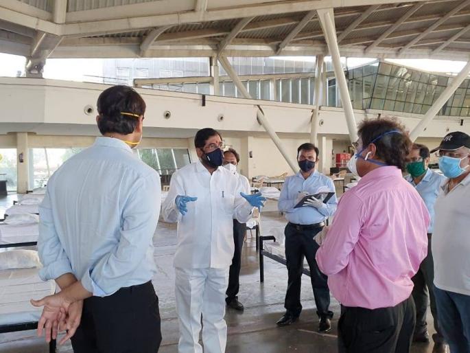 Coronavirus: Kovid Hospital under construction at CIDCO Exhibition Center in Vashi; Guardian Minister inspects | Coronavirus: वाशीतील सिडको प्रदर्शन केंद्रात कोविड रुग्णालयाचे काम सुरू;पालकमंत्र्यांकडून पाहणी Coronavirus: Kovid Hospital under construction at CIDCO Exhibition Center in Vashi; Guardian Minister inspects | Coronavirus: वाशीतील सिडको प्रदर्शन केंद्रात कोविड रुग्णालयाचे काम सुरू;पालकमंत्र्यांकडून पाहणी