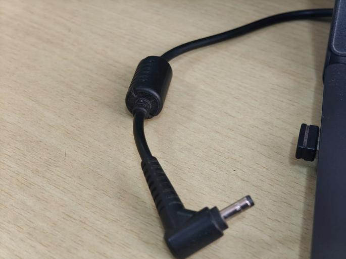What is 'that' little black ball on the laptop charger cable for? Many people must have seen it, but... | लॅपटॉप चार्जर केबलवरचा 'तो' काळा गोळा कशासाठी असतो? अनेकांनी पाहिला असेल पण...