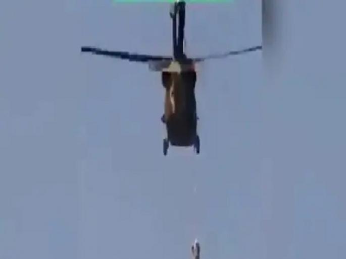 Video: Taliban's brutal face, US aid worker's body hanged to helicopter | Video: तालिबानचा क्रुर चेहरा, हेलीकॉप्टरला लटकवला अमेरिकेला मदत करणाऱ्याचा मृतदेह Video: Taliban's brutal face, US aid worker's body hanged to helicopter | Video: तालिबानचा क्रुर चेहरा, हेलीकॉप्टरला लटकवला अमेरिकेला मदत करणाऱ्याचा मृतदेह