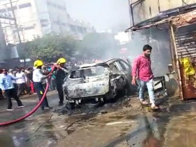 Bursting firecrackers in marriage rally A nearby car two wheeler got burnt fire brigade | वरातीत फटाके फोडणं पडलं महागात; जवळ असलेली कार, दुचाकी जळून खाक Bursting firecrackers in marriage rally A nearby car two wheeler got burnt fire brigade | वरातीत फटाके फोडणं पडलं महागात; जवळ असलेली कार, दुचाकी जळून खाक