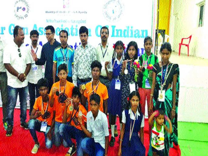 Dahanu students win fourth race in fourth round | चौथ्या राष्ट्रीय गलोल स्पर्धेत डहाणूतील विद्यार्थ्यांची बाजी