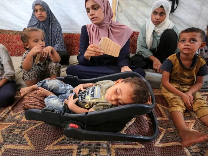 Israel-Hamas War stopped for three days; 10 month old baby became an angel to millions of children | इस्रायल आणि हमासचे युद्ध थांबले; लाखो मुलांसाठी देवदूत बनला हा 10 महिन्यांचा चिमुकला... Israel-Hamas War stopped for three days; 10 month old baby became an angel to millions of children | इस्रायल आणि हमासचे युद्ध थांबले; लाखो मुलांसाठी देवदूत बनला हा 10 महिन्यांचा चिमुकला...