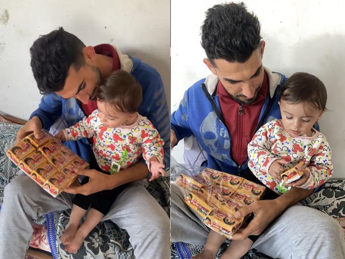 Parle-G's Rs 60 biscuits sold for Rs 2350 in Gaza; father brought it to his daughter viral video of war zone | गाझात Parle-G चा ६० रुपयांचा बिस्कीट पुडा २३५० ला; बापाने काळजाच्या तुकड्याला आणून दिला... Parle-G's Rs 60 biscuits sold for Rs 2350 in Gaza; father brought it to his daughter viral video of war zone | गाझात Parle-G चा ६० रुपयांचा बिस्कीट पुडा २३५० ला; बापाने काळजाच्या तुकड्याला आणून दिला...