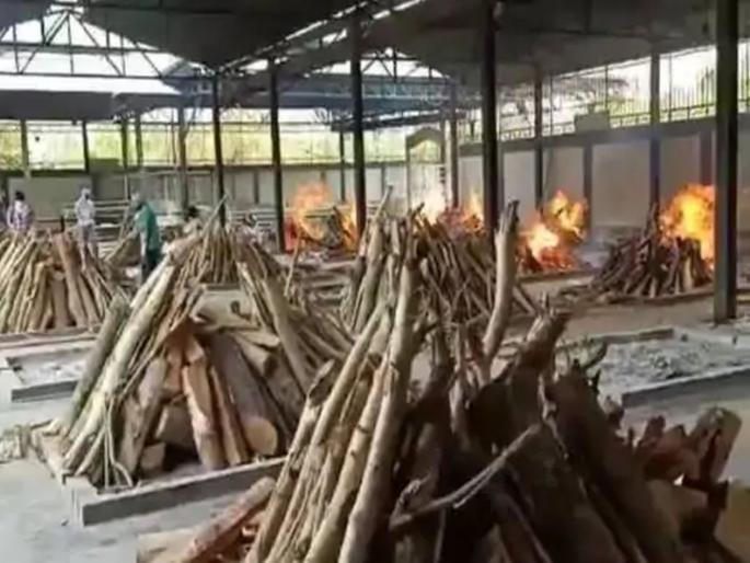 CoronaVirus News: delhi coronavirus covid 19 death cremation ground last rituals | CoronaVirus News: दिल्लीत कोरोनानं हाहाकार; स्मशानात मृतदेहांसाठी जागाच नाही CoronaVirus News: delhi coronavirus covid 19 death cremation ground last rituals | CoronaVirus News: दिल्लीत कोरोनानं हाहाकार; स्मशानात मृतदेहांसाठी जागाच नाही