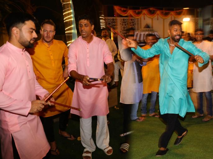 Hardik Pandya Rashid Khan Ashish Nehra Gujarat Titans cricketers play Garba Dandiya watch video IPL 2022 | Hardik Pandya Rashid Khan Garba, IPL 2022: हार्दिक पांड्यासोबत राशिद खान, नेहरा यांचा गरबा-दांडिया; पाहा व्हिडीओ