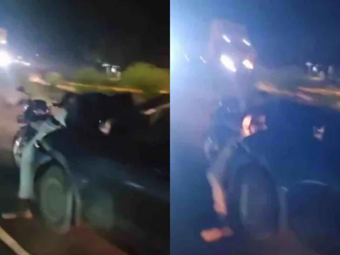 Video shocking incident in gujarat after hit and run car drags bike rider for 1 km | भयंकर! हिट अँड रननंतर कारने बाईकस्वाराला १.५ किमी फरफटतं नेलं; धडकी भरवणारा Video Video shocking incident in gujarat after hit and run car drags bike rider for 1 km | भयंकर! हिट अँड रननंतर कारने बाईकस्वाराला १.५ किमी फरफटतं नेलं; धडकी भरवणारा Video