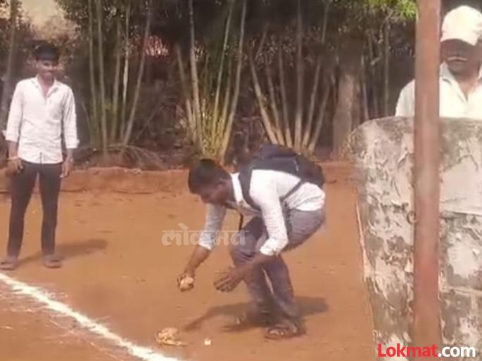 At an examination center in Ajara Kolhapur district a student entered the examination center by burning incense sticks and camphor and breaking a coconut | HSC/12th Exam: अगरबत्ती-कापूर जाळला, नारळ फोडून विद्यार्थ्याने परीक्षा केंद्रात प्रवेश केला; आजऱ्यात रंगली चर्चा  At an examination center in Ajara Kolhapur district a student entered the examination center by burning incense sticks and camphor and breaking a coconut | HSC/12th Exam: अगरबत्ती-कापूर जाळला, नारळ फोडून विद्यार्थ्याने परीक्षा केंद्रात प्रवेश केला; आजऱ्यात रंगली चर्चा