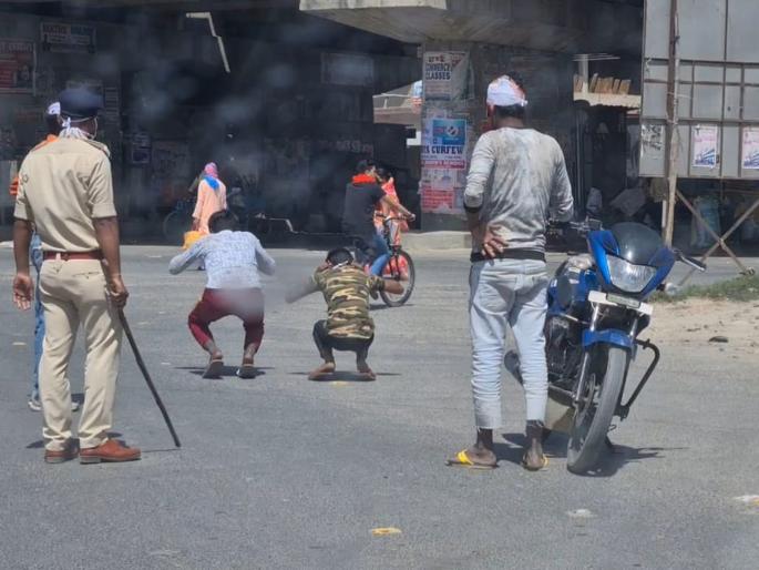 CoronaVirus : gopalganj police punished injured youth going to hospital in gopalganj during lockdown on road vrd | CoronaVirus : लाजिरवाणं! रुग्णालयात जाणाऱ्यांना बाइकवरून उतरवलं अन् बेडकासारखं चालायला लावलं CoronaVirus : gopalganj police punished injured youth going to hospital in gopalganj during lockdown on road vrd | CoronaVirus : लाजिरवाणं! रुग्णालयात जाणाऱ्यांना बाइकवरून उतरवलं अन् बेडकासारखं चालायला लावलं