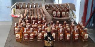 Thattali illegal liquor bag in Jalgaon MIDC | जळगाव एमआयडीसीत थाटले अवैध दारुचे अड्डे