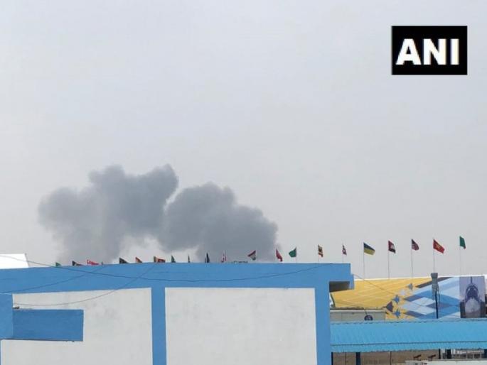 Two aircraft of the Surya Kiran Aerobatics Team crash at the Yelahanka airbase in Bengaluru | बंगळुरूत एअर शोदरम्यान मोठी दुर्घटना, दोन सूर्यकिरण विमानांची धडक Two aircraft of the Surya Kiran Aerobatics Team crash at the Yelahanka airbase in Bengaluru | बंगळुरूत एअर शोदरम्यान मोठी दुर्घटना, दोन सूर्यकिरण विमानांची धडक