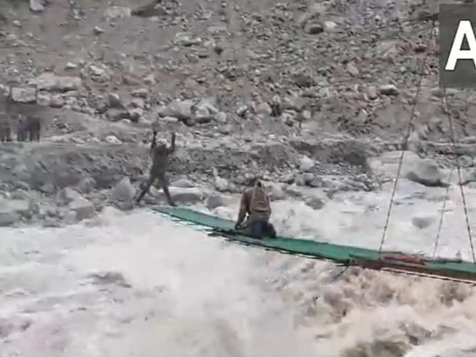 A scary speed of 40+ km! The soldiers built a bridge over the flowing river, playing for their lives sikkim; A like, one sallute | ४०+ किमीचा धडकी भरवणारा वेग! जवानांनी जिवावर खेळून वाहत्या नदीवर पूल बांधला; एक लाईक तर बनतोच A scary speed of 40+ km! The soldiers built a bridge over the flowing river, playing for their lives sikkim; A like, one sallute | ४०+ किमीचा धडकी भरवणारा वेग! जवानांनी जिवावर खेळून वाहत्या नदीवर पूल बांधला; एक लाईक तर बनतोच