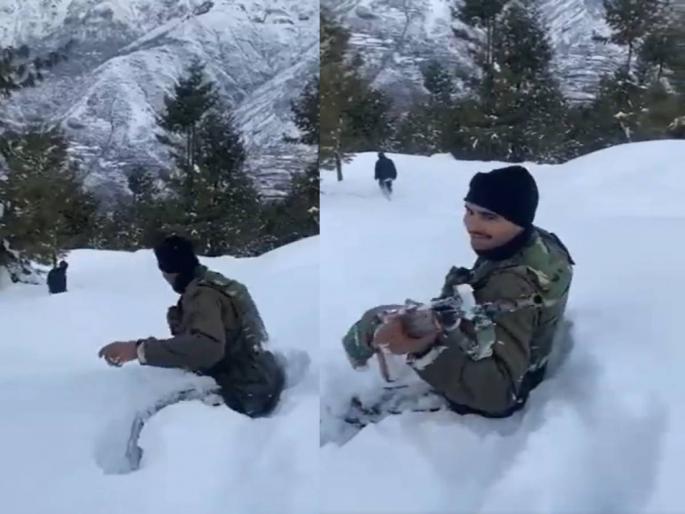 jawan can be seen walking through snow with a smile on his face indian army | जवानांच्या शौर्याला सलाम; कमरेपर्यंत शरीर अडकलं बर्फात, तरीही खंड पडेना कर्तव्यात! jawan can be seen walking through snow with a smile on his face indian army | जवानांच्या शौर्याला सलाम; कमरेपर्यंत शरीर अडकलं बर्फात, तरीही खंड पडेना कर्तव्यात!