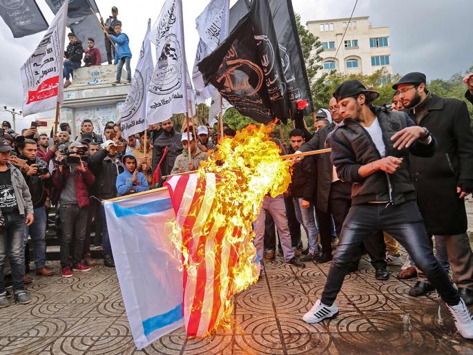 HAMAS SAYS TRUMP’S JERUSALEM DECISION 'OPENS THE GATES OF HELL' | डोनल्ड ट्रम्प यांनी उघडलं 'नरकाचं द्वार', हमासची संतप्त प्रतिक्रिया HAMAS SAYS TRUMP’S JERUSALEM DECISION 'OPENS THE GATES OF HELL' | डोनल्ड ट्रम्प यांनी उघडलं 'नरकाचं द्वार', हमासची संतप्त प्रतिक्रिया