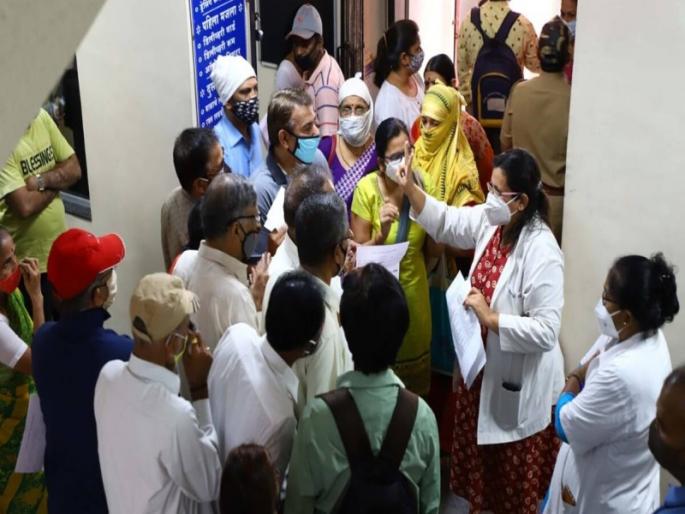 A person who went to Pune for a second dose of Corona vaccine received a certificate of vaccination before taking the dose. | दूसरी लस घेण्यापूर्वीच त्यांना मिळाला 'डोस'; पुण्यातील पती-पत्नीची थेट गुजरातमध्ये नोंद A person who went to Pune for a second dose of Corona vaccine received a certificate of vaccination before taking the dose. | दूसरी लस घेण्यापूर्वीच त्यांना मिळाला 'डोस'; पुण्यातील पती-पत्नीची थेट गुजरातमध्ये नोंद