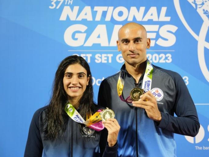Khade couple turned out to be fast swimmers; Veer Dhaval won gold medal in national sports competition | खाडे दाम्पत्य ठरले वेगवान जलतरणपटू; राष्ट्रीय क्रीडा स्पर्धेत वीरधवलला सुवर्णपदक Khade couple turned out to be fast swimmers; Veer Dhaval won gold medal in national sports competition | खाडे दाम्पत्य ठरले वेगवान जलतरणपटू; राष्ट्रीय क्रीडा स्पर्धेत वीरधवलला सुवर्णपदक