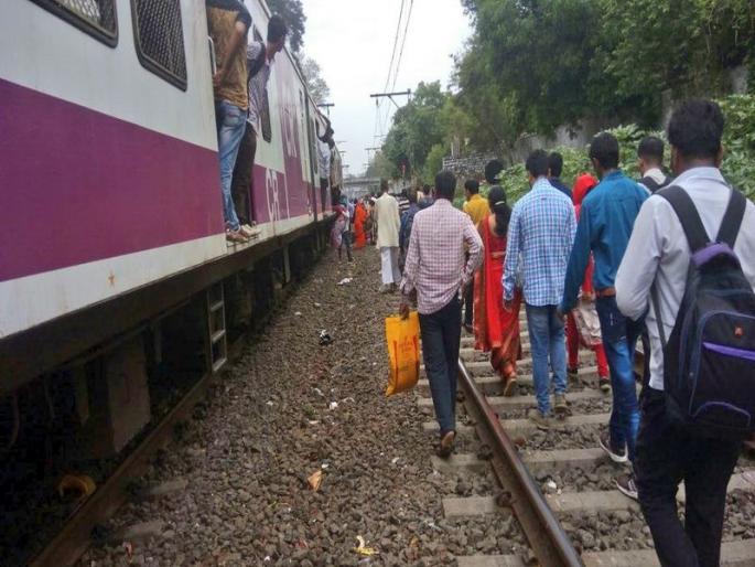 Service disruption on Kasara line of Central railway | कल्याण-कसारादरम्यान ओव्हरहेड वायर तुटली, मध्य रेल्वे विस्कळीत Service disruption on Kasara line of Central railway | कल्याण-कसारादरम्यान ओव्हरहेड वायर तुटली, मध्य रेल्वे विस्कळीत