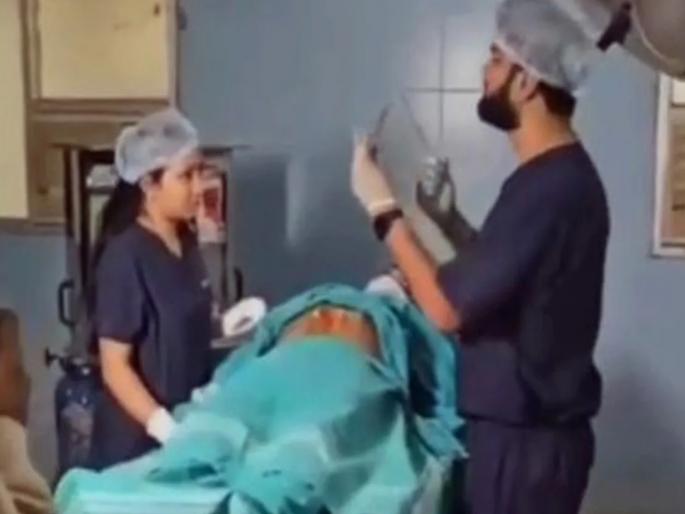 A doctor at a government hospital in Karnataka's Chitradurga district has been sacked by Health Minister Dinesh Gundu Rao for doing a pre-wedding photoshoot with his bride | सरकारी रूग्णालयातील ऑपरेशन थिएटरमध्ये प्री-वेडिंग शूट करणं भोवलं; डॉक्टर निलंबित A doctor at a government hospital in Karnataka's Chitradurga district has been sacked by Health Minister Dinesh Gundu Rao for doing a pre-wedding photoshoot with his bride | सरकारी रूग्णालयातील ऑपरेशन थिएटरमध्ये प्री-वेडिंग शूट करणं भोवलं; डॉक्टर निलंबित