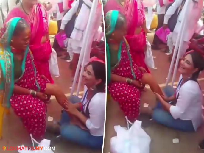 marathi actress kashmira kulkarni helps to varkari pandharpur wari video viral | वारकऱ्यांच्या सेवेत रमली मराठी अभिनेत्री; 'त्या' कृतीने जिंकली मनं, चाहत्यांनी केलं कौतुक marathi actress kashmira kulkarni helps to varkari pandharpur wari video viral | वारकऱ्यांच्या सेवेत रमली मराठी अभिनेत्री; 'त्या' कृतीने जिंकली मनं, चाहत्यांनी केलं कौतुक