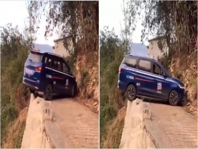 OMG shocking video goes viral driver reversing car on dangerous road | VIDEO : या अरुंद रस्त्यावर ड्रायव्हरनं अशी फिरवली कार, Skill पाहून थक्क व्हाल! OMG shocking video goes viral driver reversing car on dangerous road | VIDEO : या अरुंद रस्त्यावर ड्रायव्हरनं अशी फिरवली कार, Skill पाहून थक्क व्हाल!