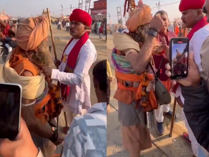 Mahakumbha 2025 person reprimanded sadhu who was hitting people with stick video goes viral | 'लट्ठमार बाबा'...! रस्त्याने ये-जा करणाऱ्यांवर लाठ्या बरसवणाऱ्या बाबाला राजस्थानी माणून नडला अन्...; बघा VIDEO Mahakumbha 2025 person reprimanded sadhu who was hitting people with stick video goes viral | 'लट्ठमार बाबा'...! रस्त्याने ये-जा करणाऱ्यांवर लाठ्या बरसवणाऱ्या बाबाला राजस्थानी माणून नडला अन्...; बघा VIDEO