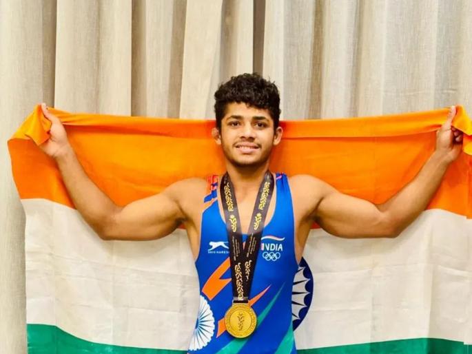 A wrestler who grew up in a hut wins a gold medal! Sunny Phulmali from Beed achieves feat in Bahrain | झोपडीत वाढलेल्या कुस्तीपटूस सुवर्णाचा 'तुरा'! बीडच्या सनी फुलमाळीचा बहरैनमध्ये पराक्रम A wrestler who grew up in a hut wins a gold medal! Sunny Phulmali from Beed achieves feat in Bahrain | झोपडीत वाढलेल्या कुस्तीपटूस सुवर्णाचा 'तुरा'! बीडच्या सनी फुलमाळीचा बहरैनमध्ये पराक्रम
