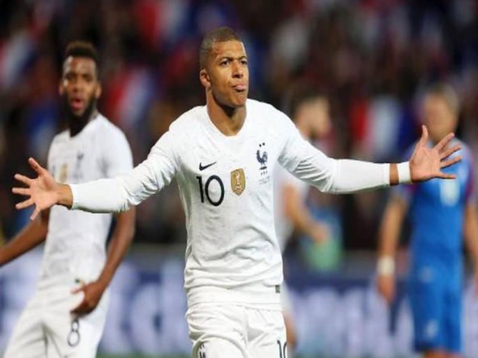 Kylian Mbappé rescues France against Iceland while Portugal see off Poland | एमबाप्पेमुळे टळला जगज्जेत्या फ्रान्सचा पराभव; आईसलॅन्डविरुद्ध साधली २-२ अशी बरोबरी Kylian Mbappé rescues France against Iceland while Portugal see off Poland | एमबाप्पेमुळे टळला जगज्जेत्या फ्रान्सचा पराभव; आईसलॅन्डविरुद्ध साधली २-२ अशी बरोबरी