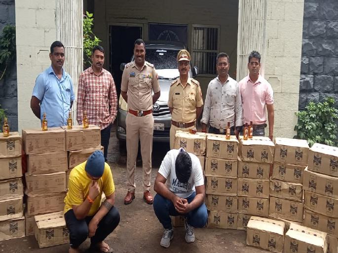 Two arrested for smuggling foreign liquor in Kolhapur | Crime News: विदेशी मद्य तस्करी करणाऱ्या दोघांना कोल्हापुरात अटक, १७ लाखांचा मुद्देमाल जप्त Two arrested for smuggling foreign liquor in Kolhapur | Crime News: विदेशी मद्य तस्करी करणाऱ्या दोघांना कोल्हापुरात अटक, १७ लाखांचा मुद्देमाल जप्त