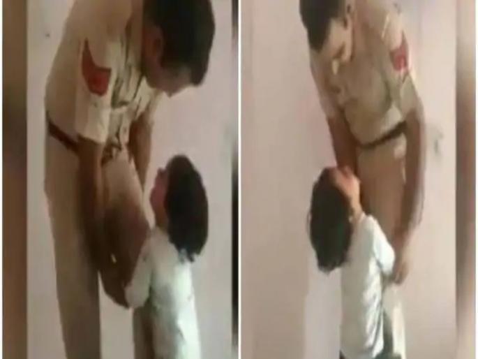 Video: cop tells son stopping him from going to work viral video | Video: पप्पा, नका ना कामाला जाऊ; पोलिसाच्या मुलाची वडिलांना विनवणी  Video: cop tells son stopping him from going to work viral video | Video: पप्पा, नका ना कामाला जाऊ; पोलिसाच्या मुलाची वडिलांना विनवणी