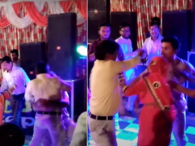 men fight in the wedding over woman while dancing video goes viral on social media | Viral Video:लग्नात नाचताना महिलेवरुन दोघांमध्ये झाली तुफान हाणामारी, घटना कॅमेऱ्यात कैद men fight in the wedding over woman while dancing video goes viral on social media | Viral Video:लग्नात नाचताना महिलेवरुन दोघांमध्ये झाली तुफान हाणामारी, घटना कॅमेऱ्यात कैद