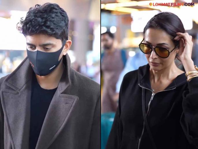 Malaika Arora was seen at the airport with a mystery man, fans said after watching the video- "This is the same boy from the concert" | मिस्ट्री मॅनसोबत एअरपोर्टवर दिसली मलायका अरोरा, व्हिडीओ पाहताच चाहते म्हणाले- "हा तर तोच कॉन्सर्टमधला मुलगा"