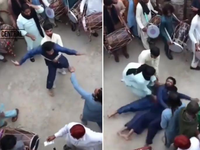 man dancing on dhol funny dance video goes viral on internet | Viral Video: ढोल वाजताच अंगात वारं भरलं याच्या, असा नाचू लागला की लोक म्हणाले अरे याला आवरा! man dancing on dhol funny dance video goes viral on internet | Viral Video: ढोल वाजताच अंगात वारं भरलं याच्या, असा नाचू लागला की लोक म्हणाले अरे याला आवरा!