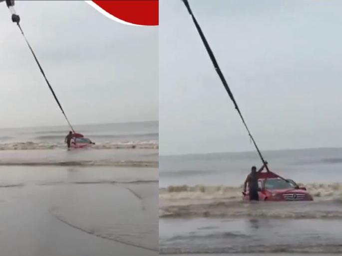 Surat Gujarat stunts on the beach goes wrong; Mercedes worth Rs 60 lakh sinks in the sea, watch the video | बीचवर स्टंट करणे तरुणाच्या अंगलट; 60 लाखांची मर्सिडीज समुद्रात अडकली, पाहा Video... Surat Gujarat stunts on the beach goes wrong; Mercedes worth Rs 60 lakh sinks in the sea, watch the video | बीचवर स्टंट करणे तरुणाच्या अंगलट; 60 लाखांची मर्सिडीज समुद्रात अडकली, पाहा Video...