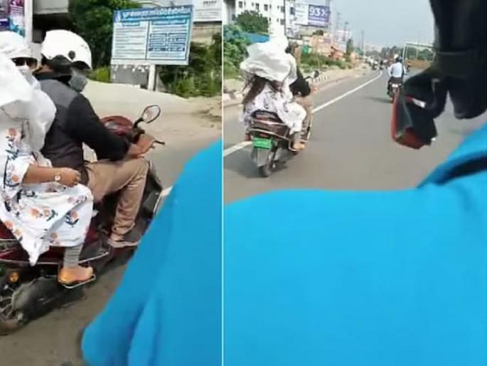 Wife was riding electric scooter with her boyfriend, husband recognized her from her dress and caught red hand video viral | बॉय फ्रेंडसोबत इलेक्ट्रीक स्कूटरवरून फिरत होती पत्नी, पतीने ड्रेसवरून ओळखले अन्... Wife was riding electric scooter with her boyfriend, husband recognized her from her dress and caught red hand video viral | बॉय फ्रेंडसोबत इलेक्ट्रीक स्कूटरवरून फिरत होती पत्नी, पतीने ड्रेसवरून ओळखले अन्...