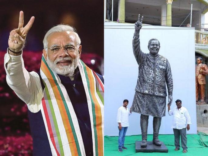 Statue of PM Narendra Modi made from scrap by father-son duo from Guntur in Bengaluru | Narendra Modi Statue: टाकाऊ साहित्यातून उभारला नरेंद्र मोदींचा १४ फूट उंच पुतळा; बाप-लेकाची कला, काय आहे खास? Statue of PM Narendra Modi made from scrap by father-son duo from Guntur in Bengaluru | Narendra Modi Statue: टाकाऊ साहित्यातून उभारला नरेंद्र मोदींचा १४ फूट उंच पुतळा; बाप-लेकाची कला, काय आहे खास?