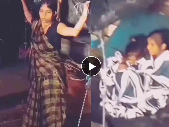 mother love viral video of a women who protect her child by rain video goes viral on social media | तिचं मायेचं छत्र! भर पावसात लेकरांसाठी लढत उभी राहिली माऊली, Video पाहून डोळ्यात येईल पाणी   mother love viral video of a women who protect her child by rain video goes viral on social media | तिचं मायेचं छत्र! भर पावसात लेकरांसाठी लढत उभी राहिली माऊली, Video पाहून डोळ्यात येईल पाणी