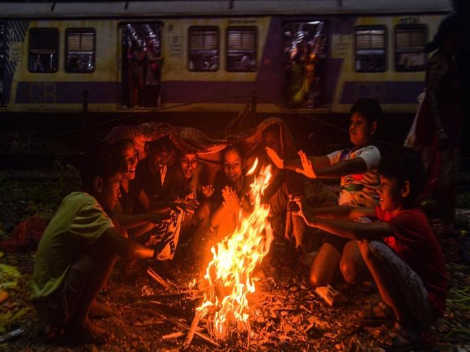 The minimum temperature in Mumbai was recorded at 16 degrees Celsius on Tuesday. After October heat, finally got some relief from the cold today | गुलाबी थंडीने पंखे, कूलर, एसी बंद; उकाड्याने त्रस्त झालेल्या मुंबईकरांना दिलासा The minimum temperature in Mumbai was recorded at 16 degrees Celsius on Tuesday. After October heat, finally got some relief from the cold today | गुलाबी थंडीने पंखे, कूलर, एसी बंद; उकाड्याने त्रस्त झालेल्या मुंबईकरांना दिलासा
