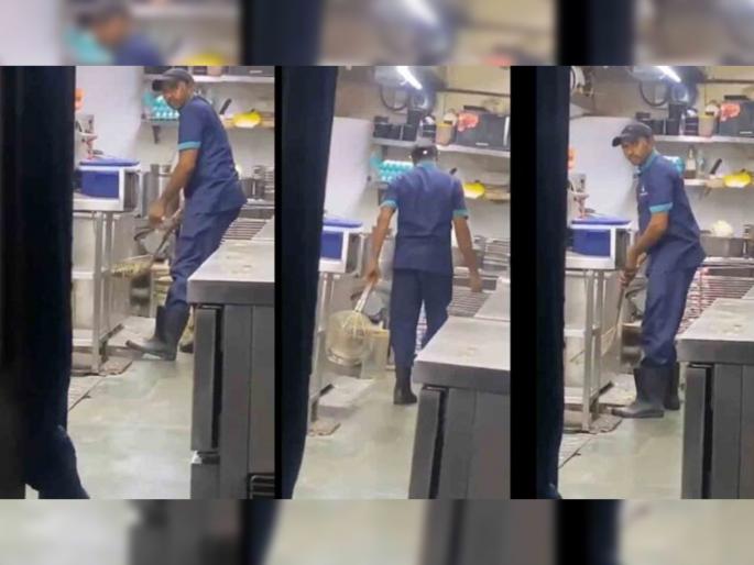 Mumbai News waste from the sewer is being removed with chikan fry net video viral | खाद्यपदार्थ तळायच्या झाऱ्याने काढला गटारातील गाळ; मुंबईच्या प्रसिद्ध हॉटेलमधील धक्कादायक प्रकार! Mumbai News waste from the sewer is being removed with chikan fry net video viral | खाद्यपदार्थ तळायच्या झाऱ्याने काढला गटारातील गाळ; मुंबईच्या प्रसिद्ध हॉटेलमधील धक्कादायक प्रकार!