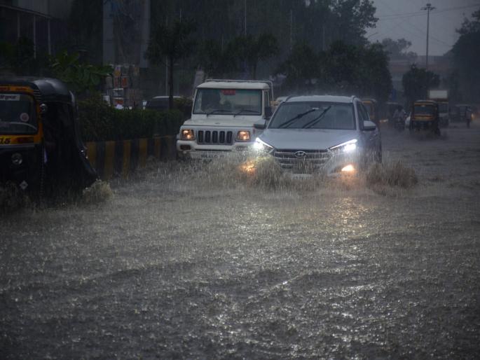 Heavy rain lashed Navi Mumbai for the second day in a row disrupting life | मुसळधार पावसामुळे जनजीवन विस्कळीत, सलग दुसऱ्या दिवशीही नवी मुंबईला झोडपले Heavy rain lashed Navi Mumbai for the second day in a row disrupting life | मुसळधार पावसामुळे जनजीवन विस्कळीत, सलग दुसऱ्या दिवशीही नवी मुंबईला झोडपले