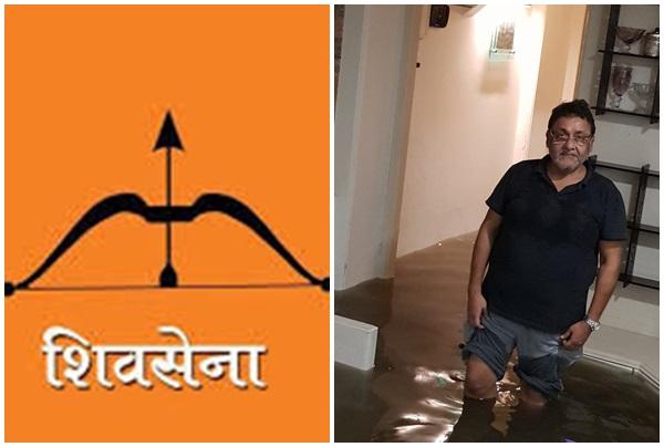 Nawab Malik party demonstrated by Shiv Sena | माजी मंत्री नवाब मलिकांच्या घरात गुडघाभर पाणी; शिवसनेने करून दाखवलं लगावला टोला Nawab Malik party demonstrated by Shiv Sena | माजी मंत्री नवाब मलिकांच्या घरात गुडघाभर पाणी; शिवसनेने करून दाखवलं लगावला टोला