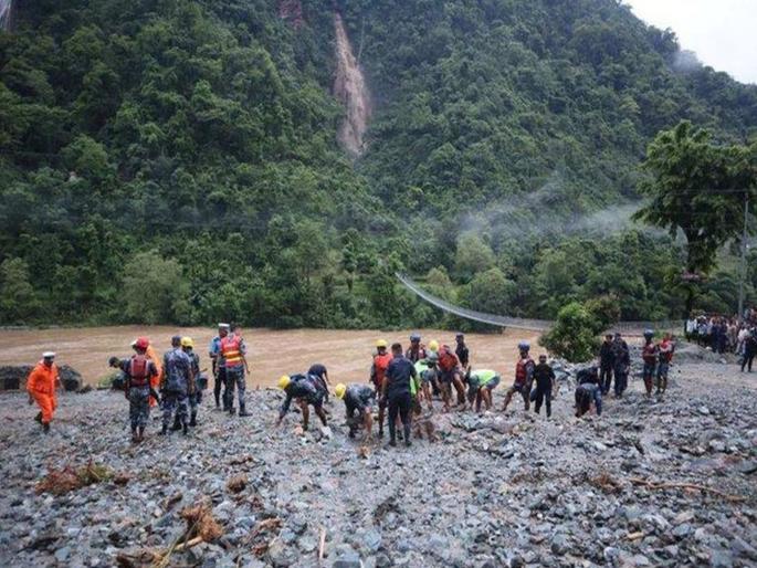 nepal Landslide news: Two buses with over 60 passengers swept into the river on Madan-Ashrit highway | नेपाळमधून धक्कादायक बातमी! भूस्खलनामुळे दोन बस नदीत वाहून गेल्या; 63 प्रवासी बेपत्ता nepal Landslide news: Two buses with over 60 passengers swept into the river on Madan-Ashrit highway | नेपाळमधून धक्कादायक बातमी! भूस्खलनामुळे दोन बस नदीत वाहून गेल्या; 63 प्रवासी बेपत्ता