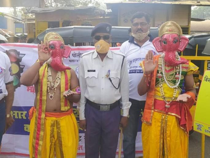 traffic rules awareness movement in kalyan and dombivli on maghi ganesh jayanti | बाप्पा आता तूच बुद्धी दे! वाहतूक नियमांचे धडे देण्यासाठी रस्त्यावर अवतरले माघी गणपती traffic rules awareness movement in kalyan and dombivli on maghi ganesh jayanti | बाप्पा आता तूच बुद्धी दे! वाहतूक नियमांचे धडे देण्यासाठी रस्त्यावर अवतरले माघी गणपती