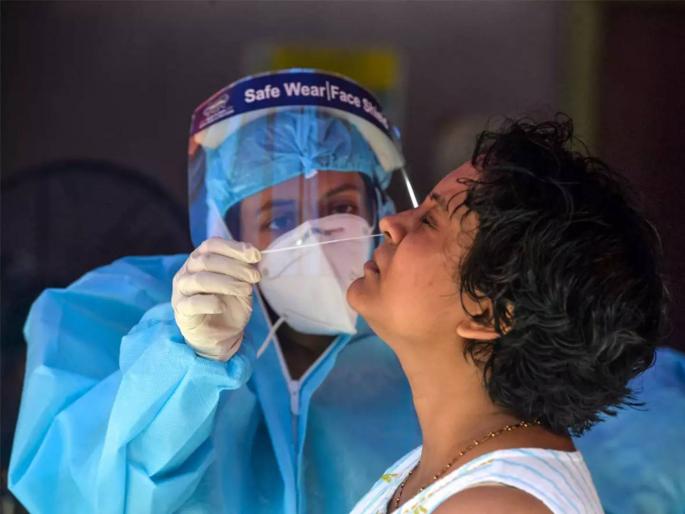 CoronaVirus News rt pcr test false test haunts as infected testing covid positive | CoronaVirus News: धोका वाढला! कोरोना लपतोय, टेन्शन वाढवतोय; गंभीर लक्षणं असूनही RT-PCR टेस्ट निगेटिव्ह CoronaVirus News rt pcr test false test haunts as infected testing covid positive | CoronaVirus News: धोका वाढला! कोरोना लपतोय, टेन्शन वाढवतोय; गंभीर लक्षणं असूनही RT-PCR टेस्ट निगेटिव्ह