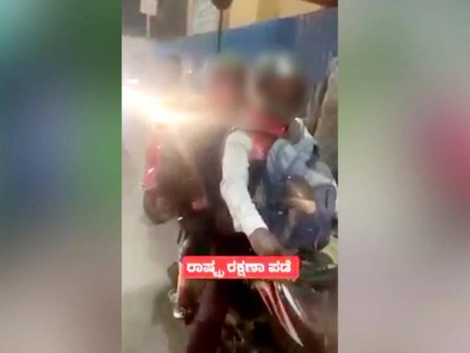 muslim youths bash up hindu man in company of muslim woman in bangalore | लाज नाही वाटत तुला? हिंदू तरुणासोबत बाईकवरून जाणाऱ्या मुस्लिम महिलेला दोघांनी रोखलं muslim youths bash up hindu man in company of muslim woman in bangalore | लाज नाही वाटत तुला? हिंदू तरुणासोबत बाईकवरून जाणाऱ्या मुस्लिम महिलेला दोघांनी रोखलं
