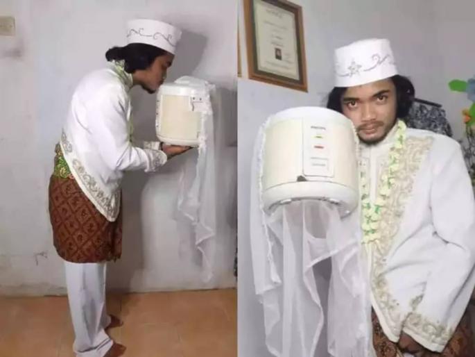 ndonesian Man Marries To Pressure Cooker Divorces After Few Days By Saying My Wife Can Only Cook Rice | आठवड्याभरात संसार मोडला; तरुणाचा कूकर पत्नीला घटस्फोट; कारणही सांगितलं ndonesian Man Marries To Pressure Cooker Divorces After Few Days By Saying My Wife Can Only Cook Rice | आठवड्याभरात संसार मोडला; तरुणाचा कूकर पत्नीला घटस्फोट; कारणही सांगितलं