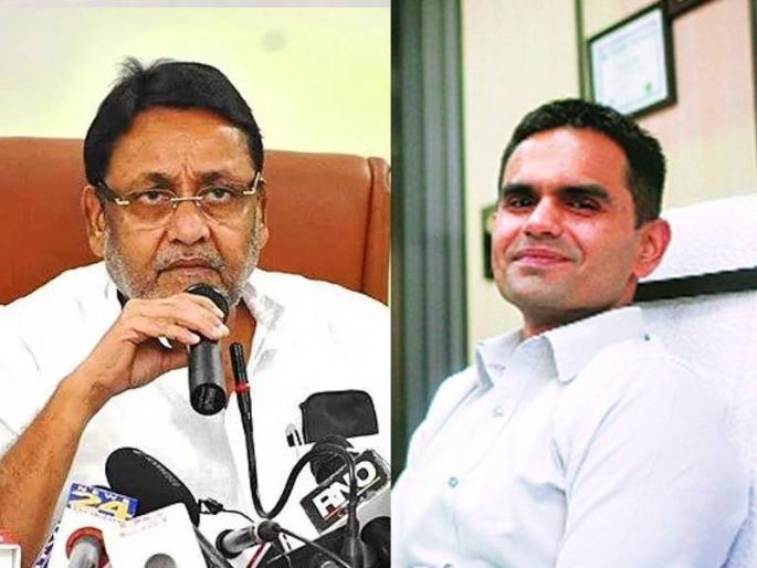 NCB vs Nawab Malik: Sameer Wankhede's reaction on wedding photo whose tweet by NCP Nawab Malik | NCB vs Nawab Malik: 'त्या' लग्नाच्या फोटोबाबत समीर वानखेडेंचं मोजक्या शब्दात उत्तर; मलिकांच्या आरोपांनी पुन्हा धुमशान NCB vs Nawab Malik: Sameer Wankhede's reaction on wedding photo whose tweet by NCP Nawab Malik | NCB vs Nawab Malik: 'त्या' लग्नाच्या फोटोबाबत समीर वानखेडेंचं मोजक्या शब्दात उत्तर; मलिकांच्या आरोपांनी पुन्हा धुमशान