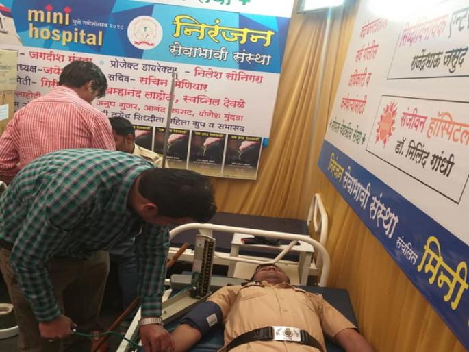 950 people health checking in mini hospital with 26 hours at immersion procession o | विसर्जनाला २६ तासांत मिनी हॉस्पिटलमध्ये ९५० जणांची तपासणी 950 people health checking in mini hospital with 26 hours at immersion procession o | विसर्जनाला २६ तासांत मिनी हॉस्पिटलमध्ये ९५० जणांची तपासणी