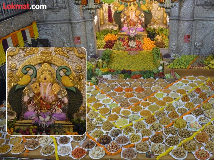 On the occasion of Tripurari Purnima, a food offering was made in front of Shrimant Dagdusheth's beloved Bappa; a grand offering of 521 items | त्रिपुरारी पौर्णिमेनिमित्त श्रीमंत दगडूशेठच्या लाडक्या बाप्पासमोर अन्नकोट; तब्बल ५२१ पदार्थांचा महानैवेद्य On the occasion of Tripurari Purnima, a food offering was made in front of Shrimant Dagdusheth's beloved Bappa; a grand offering of 521 items | त्रिपुरारी पौर्णिमेनिमित्त श्रीमंत दगडूशेठच्या लाडक्या बाप्पासमोर अन्नकोट; तब्बल ५२१ पदार्थांचा महानैवेद्य